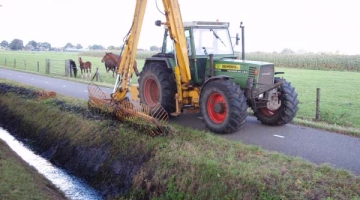 Trekker met herder en maaikorf